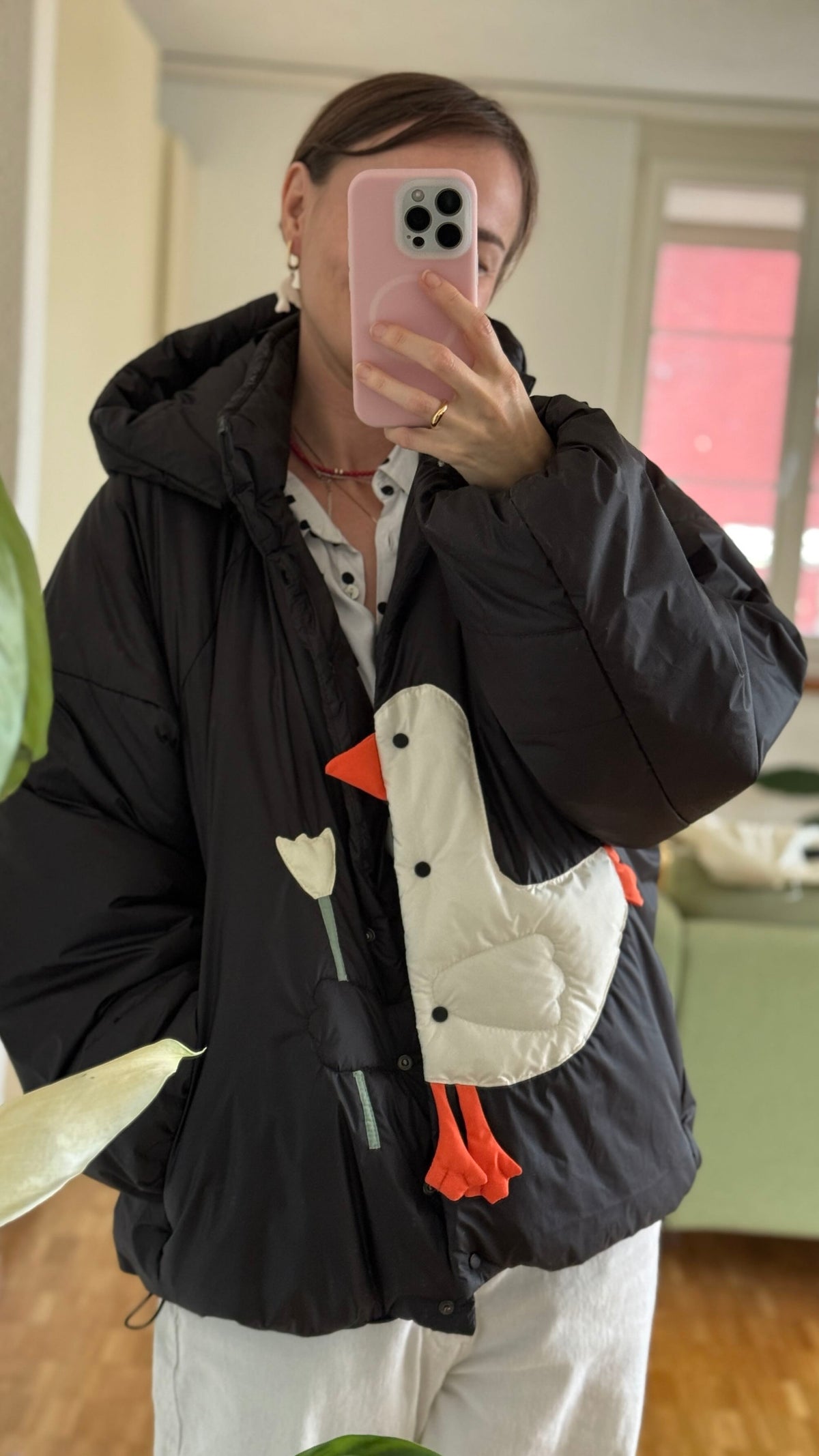 Down jacket  "Little duck" in black with detachable bows and removable hood
