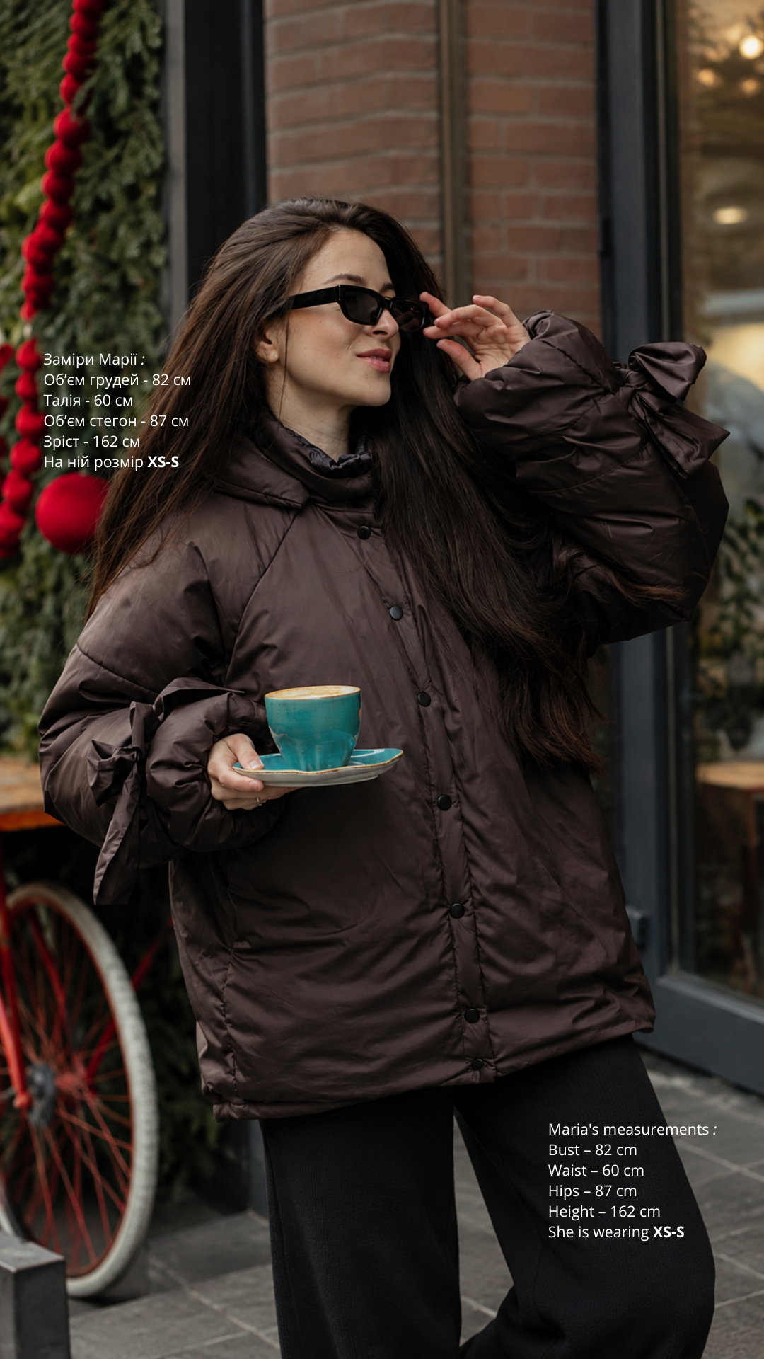 Down jacket in black with detachable chocolate and removable hood