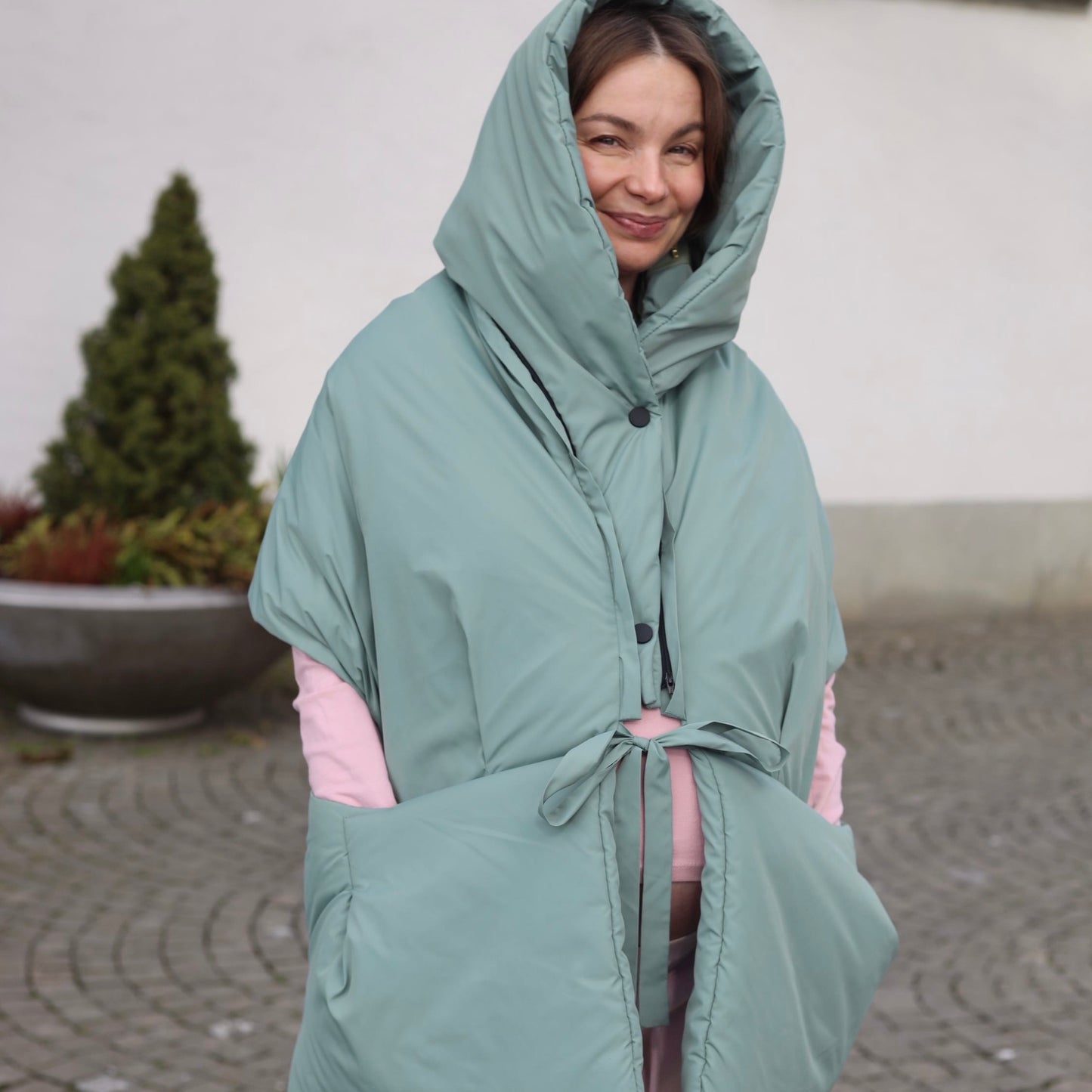 <tc>Жилетка кольору нефрит з відстібним капюшоном</tc>