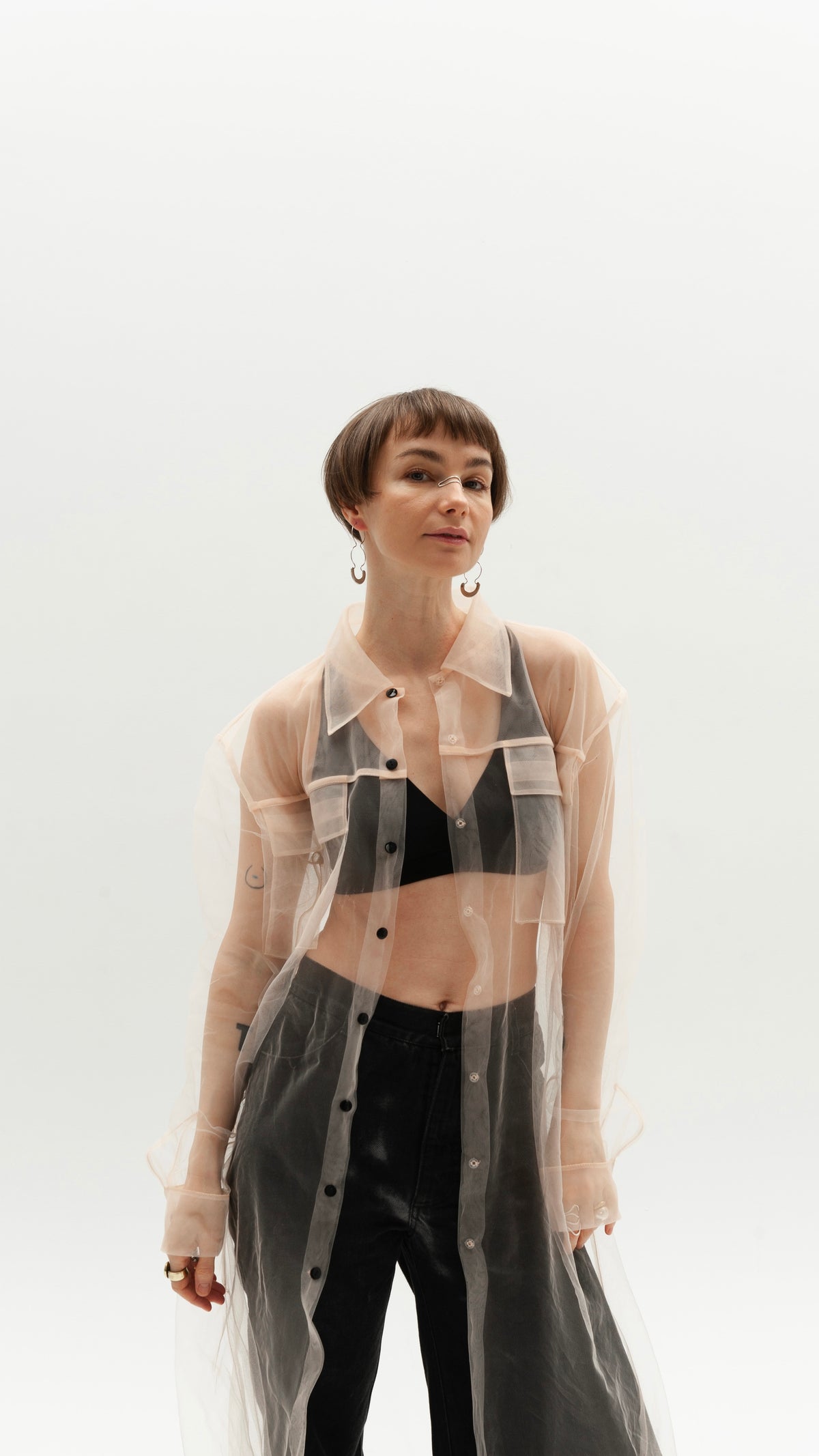 Elongated transparent beige shirt