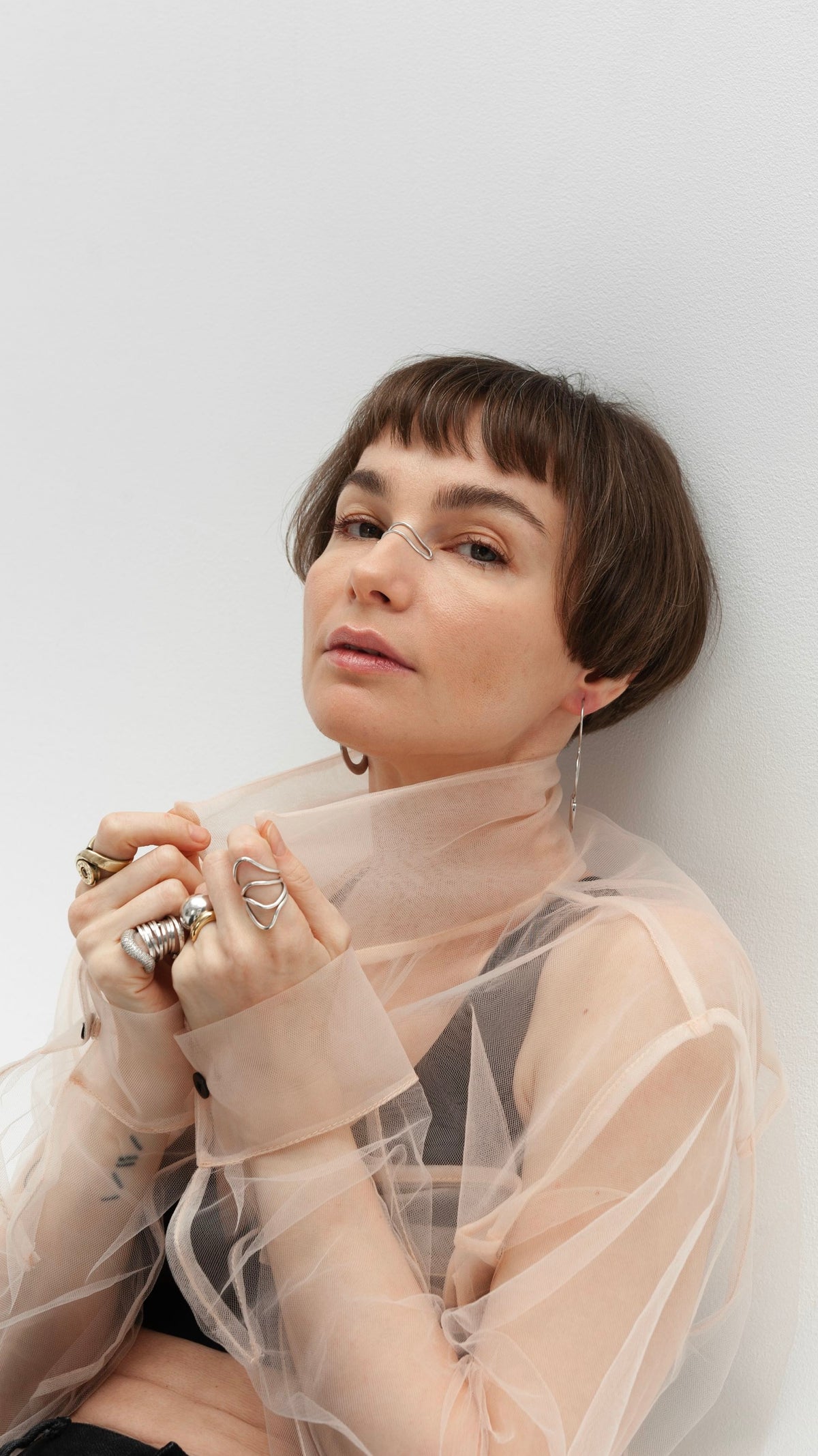 Elongated transparent beige shirt