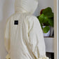Down jacket in yellow butter with detachable powder and removable hood