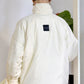 Down jacket in yellow butter with detachable powder and removable hood