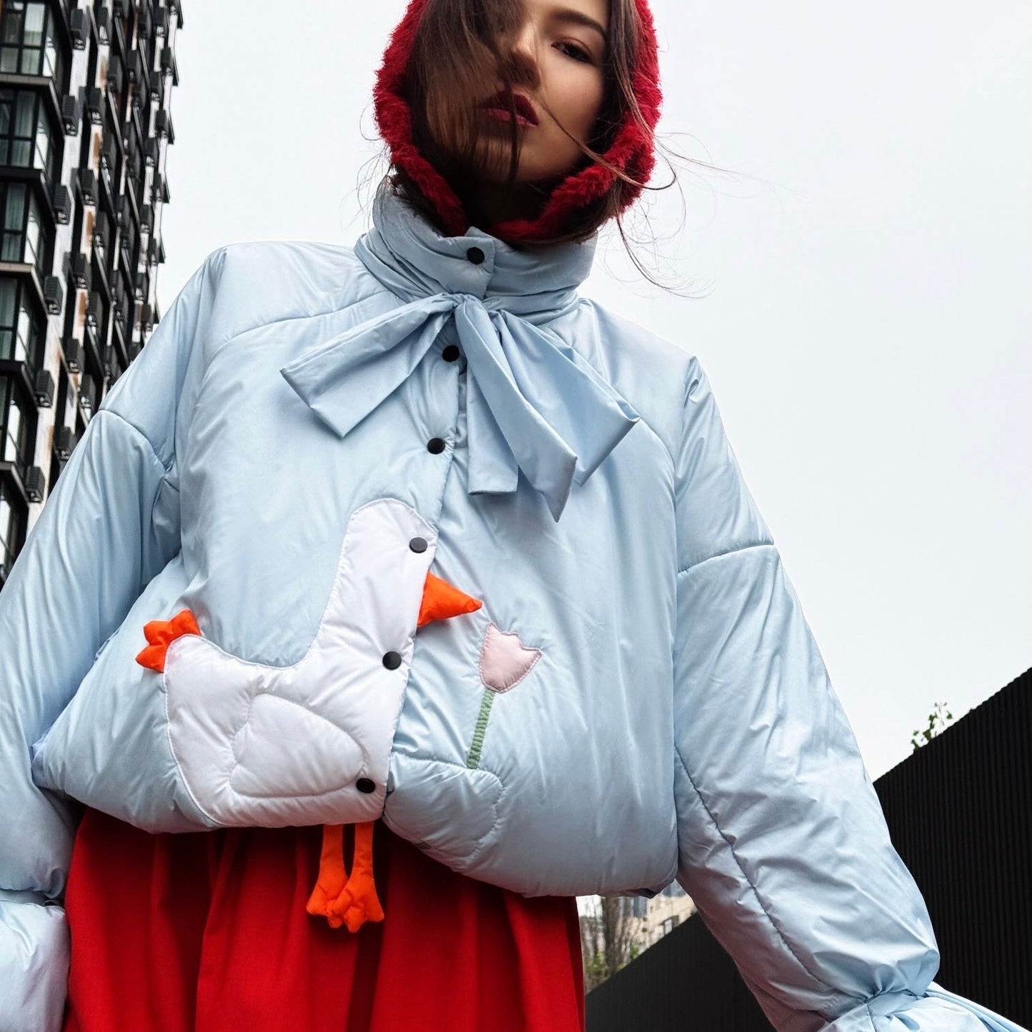 Down jacket  "Little duck" in blue with detachable bows and removable hood