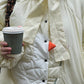 Down jacket  "Little duck" in yellow butter with detachable bows and removable hood