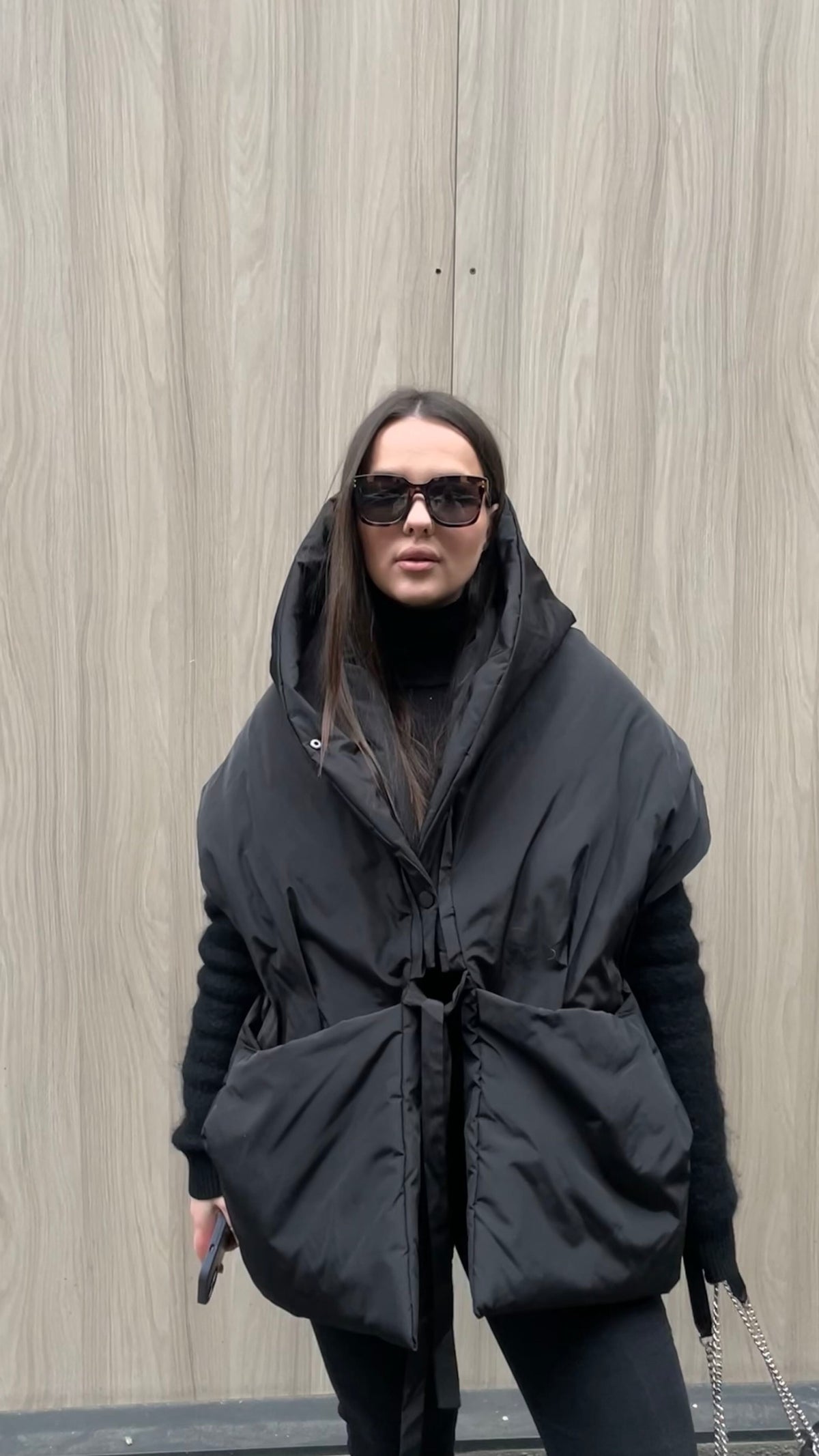 Black Down vest with detachable hood