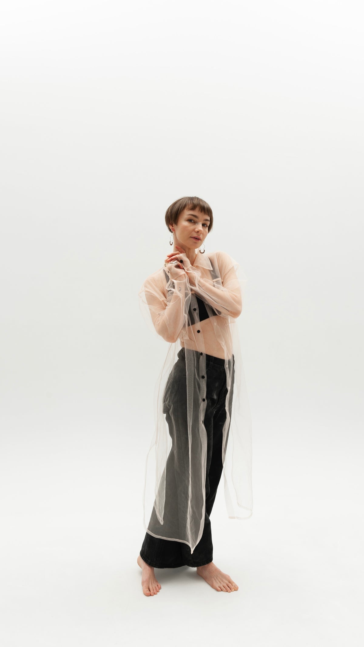 Elongated transparent beige shirt