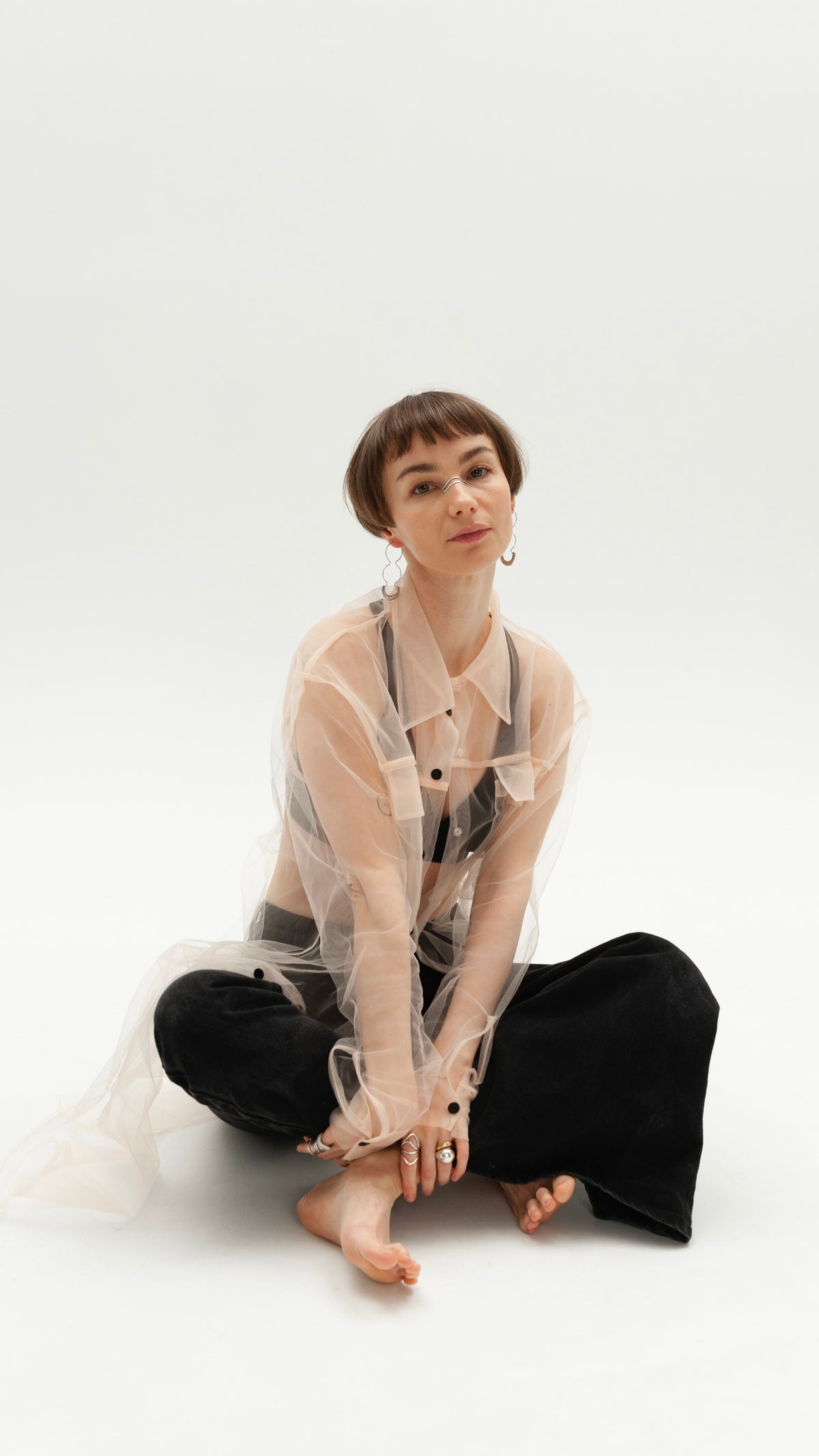 Elongated transparent beige shirt