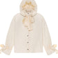 Down jacket in yellow butter with detachable powder and removable hood