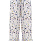 Pants with flounces a bird print