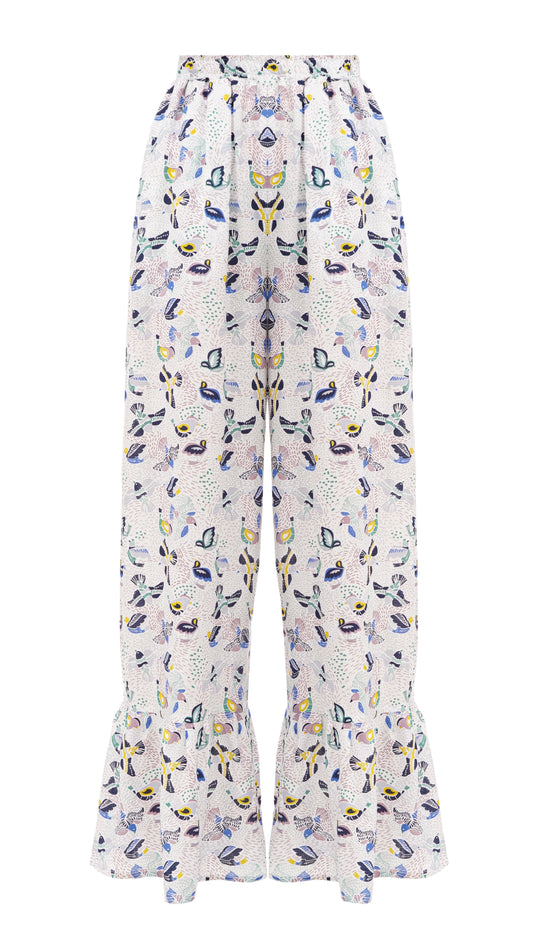 Pants with flounces a bird print