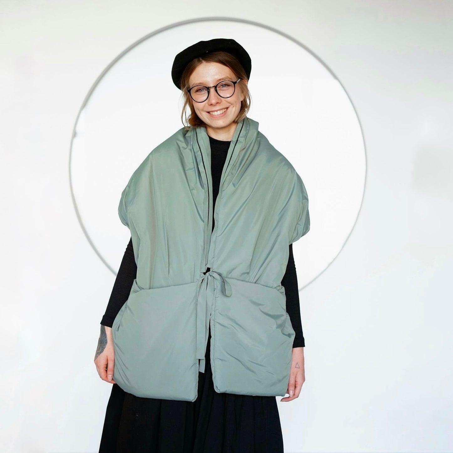 <tc>Жилетка кольору нефрит з відстібним капюшоном</tc>