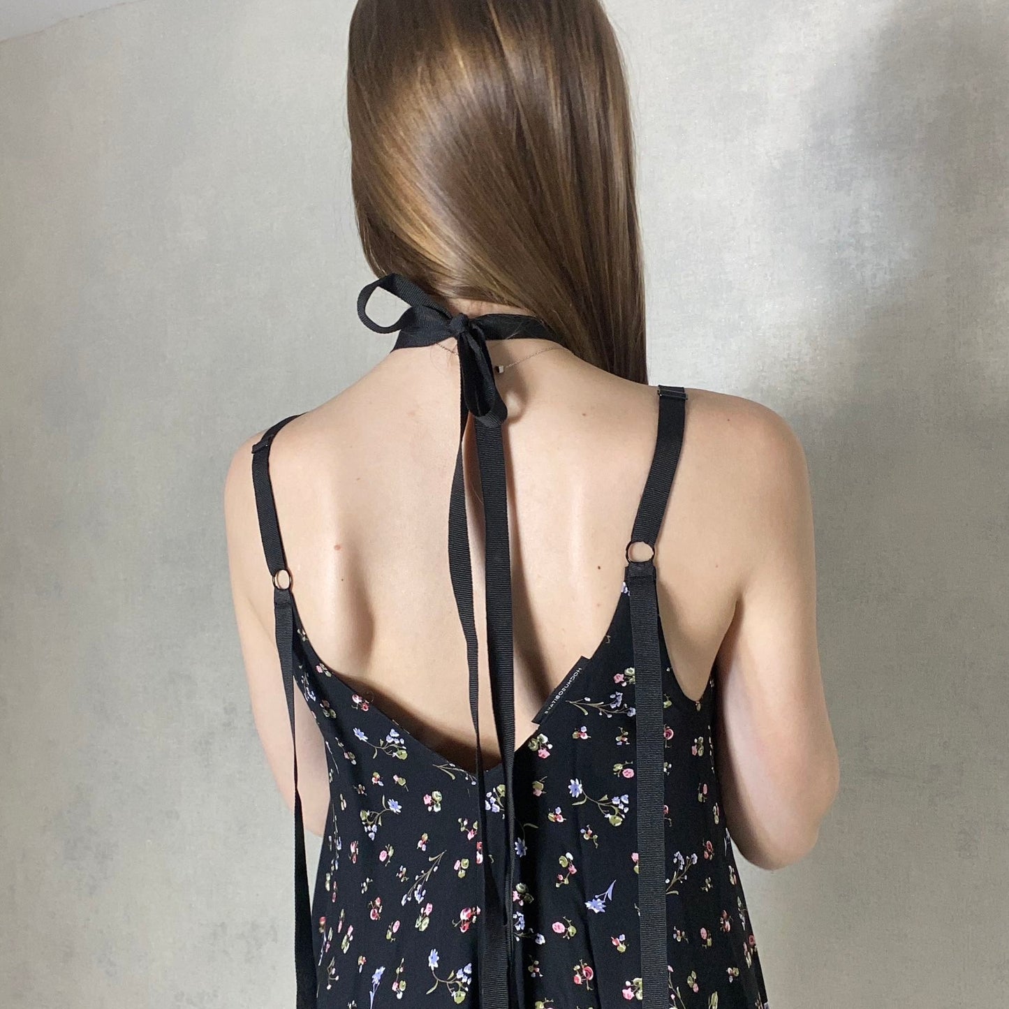 Black dress with ribbons with a floral print